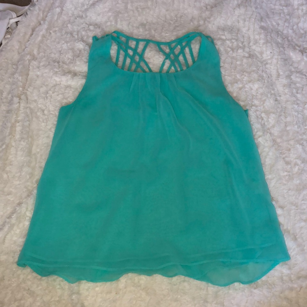 Teal flowy tank top. Size medium.
